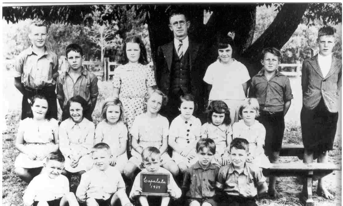 Tom McGrath and the class of  1939, Capalaba School. Tom  taught at Capalaba for over 25  years. Credit - Redland City Council Local History Collection.